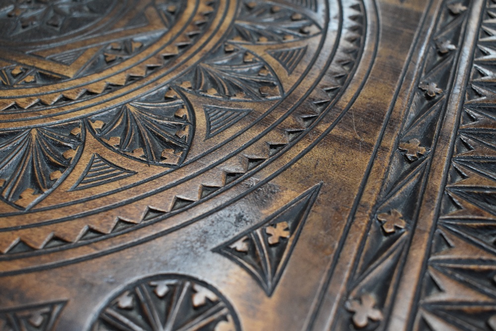 An extensively carved side or hall table table having square top and undertiert, frieze drawer - Image 2 of 4