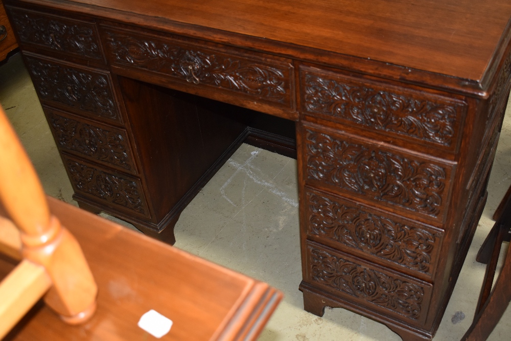 A 19th Century oak desk having extensively carved drawers, no keys but all drawers currently - Image 2 of 6