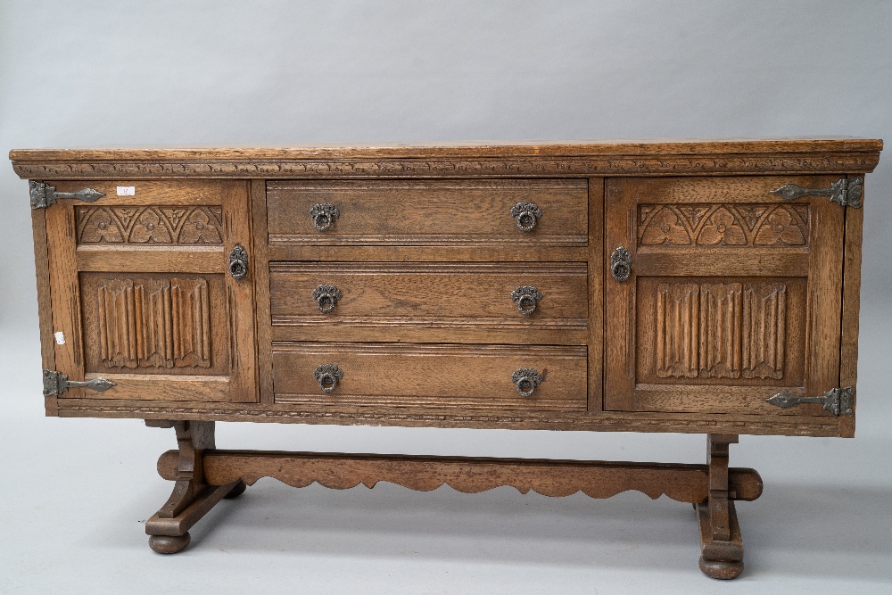 A traditional stained frame Priory style sideboard, width approx. 161cm
