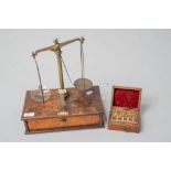 A 19th Century mahogany and brass set of jewellers or similar scales