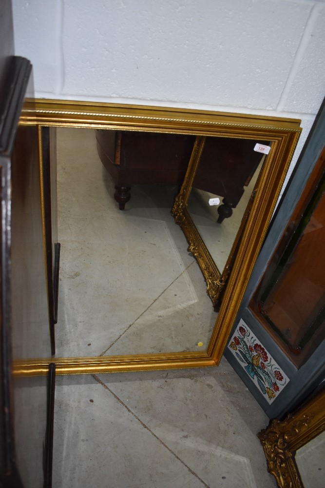 A modern gilt frame wall mirror, 85 x 60cm