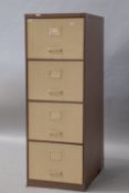 A Triumph metal industrial/office filing cabinet in brown and creamt, having four drawers , also