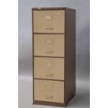 A Triumph metal industrial/office filing cabinet in brown and creamt, having four drawers , also