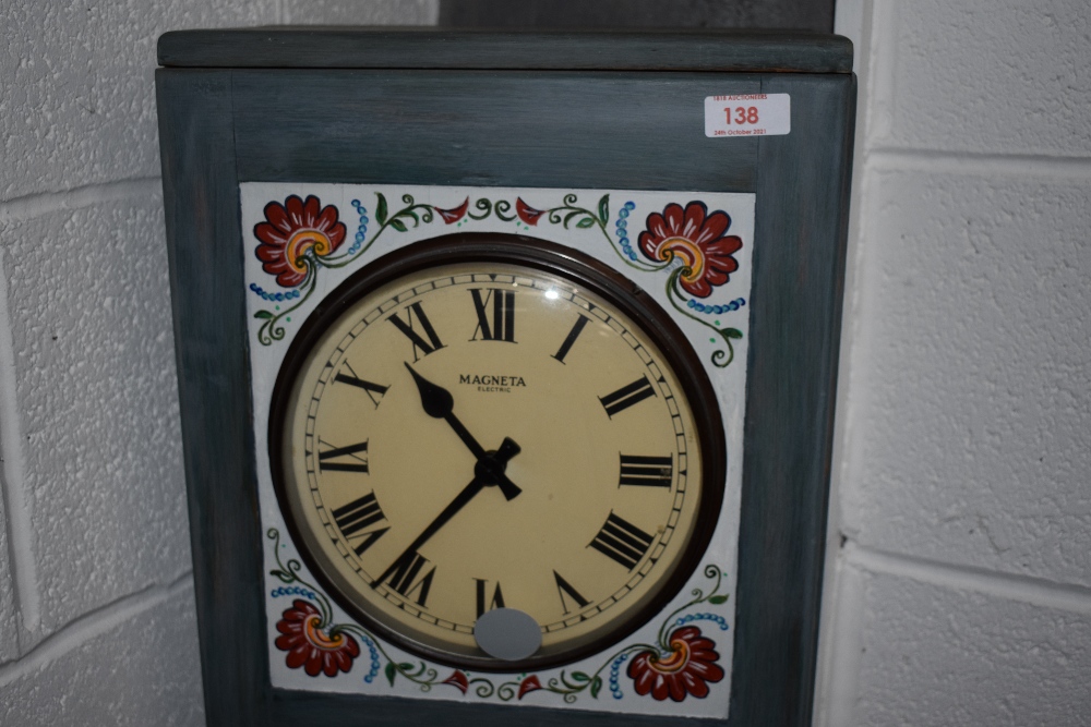 A Magneta Electric clock, model 37, serial number 5239, the case being later painted and