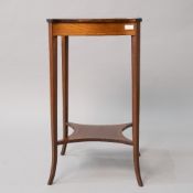 An Edwardian mahogany occasional table or plant stand with typical inlay decoration to top, frieze