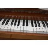 A modern upright piano , inlaid Zender, in polished mahogany case being overstrung, width approx.