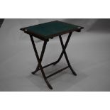 An early to mid 20th Century mahogany fold up card table on turned frame, approx. 61 x 50cm