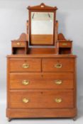 A late 19th or early 20th Century mahogany dressing table possibly Arts and Crafts with turned frame
