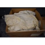 A box of vintage furs for make do and mend or repair including an ermine cape having Harrods label.