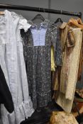 A collection of three childrens vintage dresses.