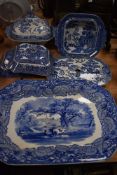 A selection of blue and white table wares including lidded tureen and drip tray