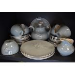 A part tea service by Royal Doulton in the Forest Glade design having a duck egg blue on white glaze