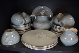 A part tea service by Royal Doulton in the Forest Glade design having a duck egg blue on white glaze