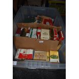 A selection of vintage cigarette advertising boxes and packets