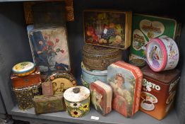 A selection of collectable biscuit and similar tins including pressed designs