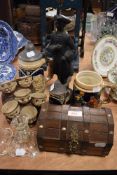 A selection of ceramics including German beer steins and black glaze figure