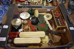 A selection of dressing table items including Stratton lipstick and mother of pearl compact