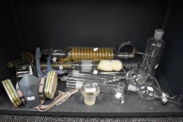 A selection of scientific glass measures and tubes for chemistry or experiments