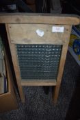 A vintage 1920's glass wash board