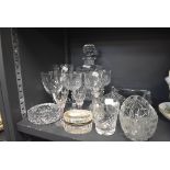 A selection of clear cut crystal glass wares including wine glasses and decanter etc