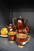 A part tea service by Carlton ware in the rouge royale design serving six