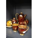 A part tea service by Carlton ware in the rouge royale design serving six
