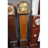 A lang cased grandmother clock having ormalu style decoration with gilt detail case