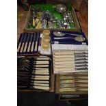 A selection of table wares cutlery and flatwares including cased and boxed items