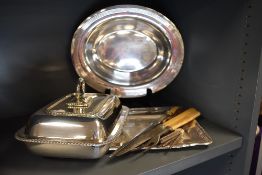 A selection of plated ware and table cutlery including lidded serving dish