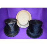 Two Victorian top hats one marked Paris 1889, Fox Blackpool, also a straw boater style hat