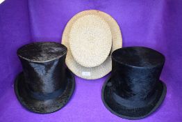Two Victorian top hats one marked Paris 1889, Fox Blackpool, also a straw boater style hat