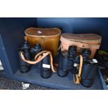 Two sets of binoculars including Horizon 7x50 and Chiyoko 10x50 both having leather cases