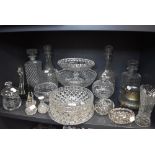 A selection of vintage clear cut and pressed glass wares including iridescent Loetz style vase