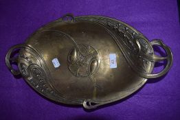 A twin handle WMF art nouveau design metal serving tray twin handled with brass plate