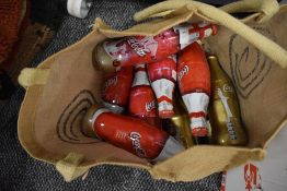 A selection of collectable Coca Cola bottles