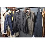 Four mens jackets including waterproof and canvas.