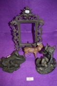 An ornate Victorian picture or photo frame in cast metal and three figures including deer