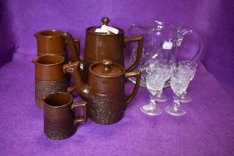 A ceramic part tea set in a brown colour way by Gibsons