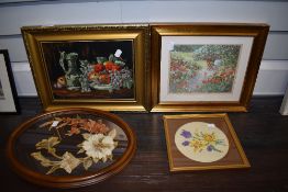 A selection of needlework embroidery and a print