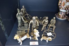 A selection of both metal cast and ceramic figures including small dogs
