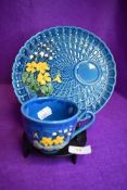 A mid century style tennis cake and tea cup set by West German pottery in a blue and yellow design