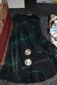 A vintage Scottish kilt and accessories for the Cameron clan in a green tartan