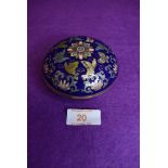 A lidded cloisonne trinket dish in a deep cobalt blue ground with floral design