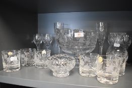 A selection of clear cut crystal glass wares by Stuart in a Snow drop design