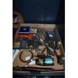 A selection of curios and trinkets including various pocket cigarette lighters and pipe etc