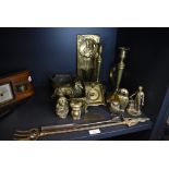 A selection of brass wares including figures, pair of candle sticks, fold out ashtray and incense