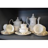 A fine party tea and coffee service by Royal Albert in the Val D'or design having white ground and