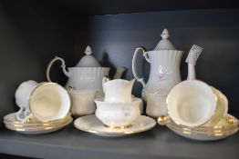 A fine party tea and coffee service by Royal Albert in the Val D'or design having white ground and