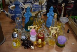 A selection of various design mid century Avon aftershave and perfume bottles