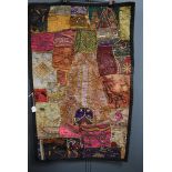 A vintage panel or sampler using panels of various fabrics with embroidery,sequins, braid work and